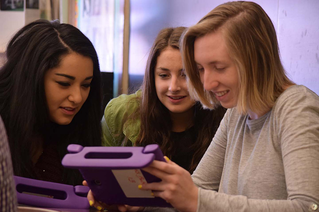 Students working on tablets