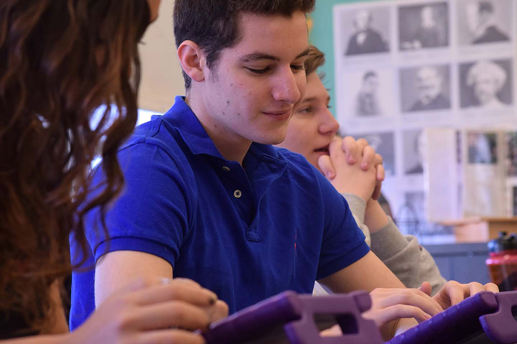 Students working on tablets