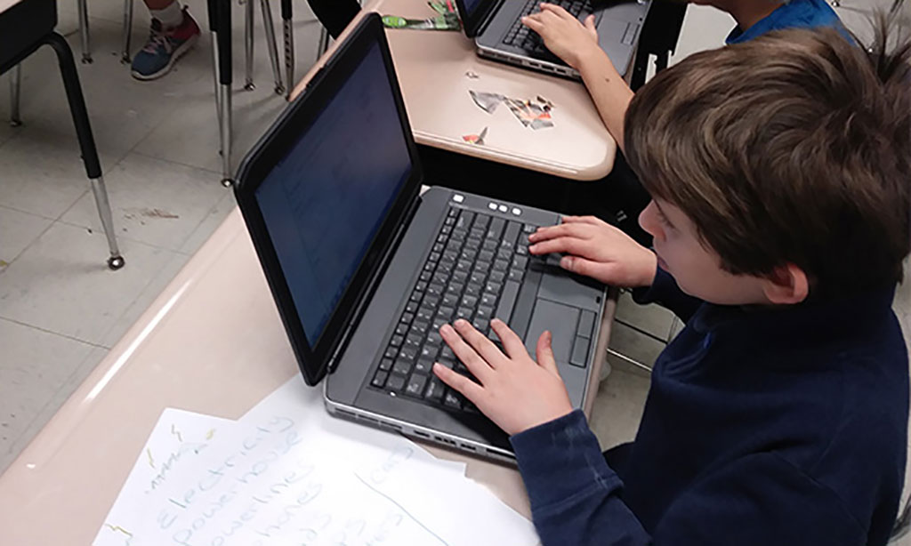 A student working on their computer